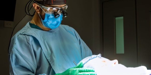 surgeon performing procedure in operating room